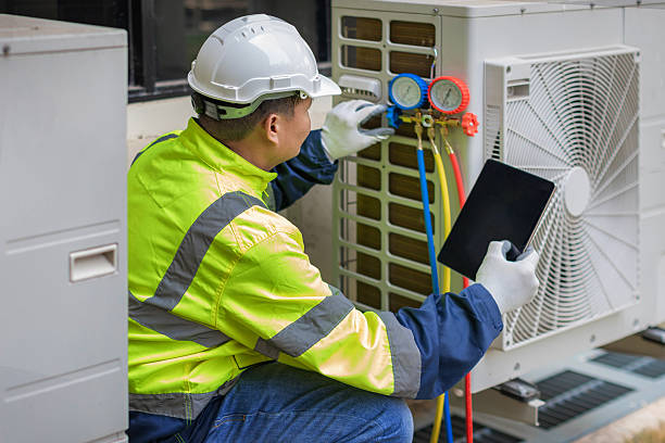 Professional Hvac technician working in Bellingham, MA